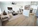 Bright living room with light beige carpet and modern furniture at 4292 Maple Ne St, St Petersburg, FL 33703