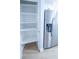 Empty pantry with white shelves offering ample storage space at 4292 Maple Ne St, St Petersburg, FL 33703
