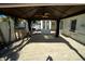 Covered patio area with pavers and ceiling fan at 4292 Maple Ne St, St Petersburg, FL 33703