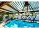 Enjoy this refreshing pool with pergola and outdoor lighting at 4292 Maple Ne St, St Petersburg, FL 33703