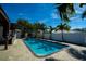 Large refreshing pool with a spacious patio area at 4292 Maple Ne St, St Petersburg, FL 33703