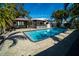 Private backyard oasis with a refreshing pool and patio at 4292 Maple Ne St, St Petersburg, FL 33703