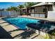 Relaxing pool and spa area with adjacent bar and gazebo at 4292 Maple Ne St, St Petersburg, FL 33703