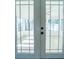 Bright sunroom with French doors and tile floor at 4292 Maple Ne St, St Petersburg, FL 33703