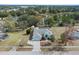 Aerial view showcasing the house, backyard, and neighborhood at 4438 Crescent Rd, Spring Hill, FL 34606