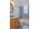 Bathroom with a vanity, toilet, and shower/tub combo at 4438 Crescent Rd, Spring Hill, FL 34606