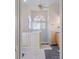 Bathroom boasts a walk-in shower, walk-in tub, and double vanity at 4438 Crescent Rd, Spring Hill, FL 34606