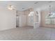 Spacious entrance with tile floors and high ceilings at 4438 Crescent Rd, Spring Hill, FL 34606