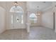 Bright entryway with tile floors and high ceilings at 4438 Crescent Rd, Spring Hill, FL 34606