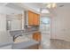 Kitchen with wood cabinets and stainless steel appliances at 4438 Crescent Rd, Spring Hill, FL 34606