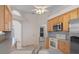Kitchen with wood cabinets and stainless steel appliances at 4438 Crescent Rd, Spring Hill, FL 34606