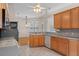 Kitchen with wood cabinets and stainless steel appliances at 4438 Crescent Rd, Spring Hill, FL 34606