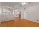 Bright and airy living room with kitchen access at 4438 Crescent Rd, Spring Hill, FL 34606