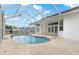 Inviting screened pool with a spacious deck at 4438 Crescent Rd, Spring Hill, FL 34606