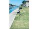 Peaceful waterfront view with a bench and egret at 4555 Marine Pkwy # 103, New Port Richey, FL 34652