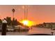 Stunning sunset over canal, boats docked, waterfront property at 4555 Marine Pkwy # 103, New Port Richey, FL 34652