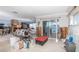 Living room with fireplace and water views, currently under renovation at 4949 Waterside Dr, Port Richey, FL 34668