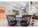 Modern kitchen with gray cabinets and breakfast bar at 5021 Secretariat Run, Spring Hill, FL 34609