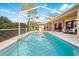 Inviting screened pool with ample deck space for lounging at 5021 Secretariat Run, Spring Hill, FL 34609