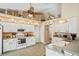 Bright kitchen with white cabinetry, ample counter space, and appliances at 541 Bent Oak Ct, Spring Hill, FL 34609