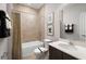 Bathroom with tub shower combination, vanity sink and toilet at 6021 Wild Petunia Dr, Wimauma, FL 33598