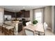 Kitchen features breakfast nook and access to backyard at 6027 Wild Petunia Dr, Wimauma, FL 33598