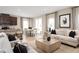Open concept living room and kitchen with breakfast area at 6027 Wild Petunia Dr, Wimauma, FL 33598