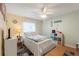 Bedroom with double bed, ceiling fan, and flamingo bedding at 6225 Emerson Dr, New Port Richey, FL 34653