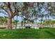 White footbridge over water with lush landscaping at 6225 Emerson Dr, New Port Richey, FL 34653