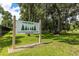 The Pines 55+ community entrance sign at 6225 Emerson Dr, New Port Richey, FL 34653