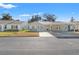 Quaint single-story home with carport and well-maintained landscaping at 6225 Emerson Dr, New Port Richey, FL 34653