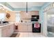Galley kitchen with ample counter space and appliances at 6225 Emerson Dr, New Port Richey, FL 34653