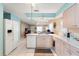 Eat-in kitchen with island and views to living room at 6225 Emerson Dr, New Port Richey, FL 34653