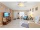 Living room with tiled floors and comfy seating at 6225 Emerson Dr, New Port Richey, FL 34653