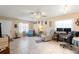 Living area with tiled floors and a home office space at 6225 Emerson Dr, New Port Richey, FL 34653