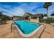 Refreshing community pool with ample lounge chairs and covered seating at 6225 Emerson Dr, New Port Richey, FL 34653