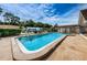 Sparkling community pool with plenty of room for relaxation at 6225 Emerson Dr, New Port Richey, FL 34653