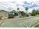 Community shuffleboard courts near pool and clubhouse at 6225 Emerson Dr, New Port Richey, FL 34653