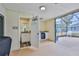 Screened in lanai with a bathroom featuring a granite vanity and a mini refrigerator at 6520 Pine Meadows Dr, Spring Hill, FL 34606