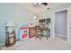 Bedroom boasts neutral carpeting, ceiling fan, and ample space for furnishings at 6520 Pine Meadows Dr, Spring Hill, FL 34606