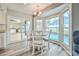 Breakfast nook featuring a sunlit space with backyard views and seamless access to the kitchen at 6520 Pine Meadows Dr, Spring Hill, FL 34606