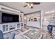 Open concept living room with view into kitchen and dining area at 6520 Pine Meadows Dr, Spring Hill, FL 34606