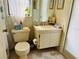 Clean bathroom with toilet, sink, and shower at 7240 Dogleg Ct, Port Richey, FL 34668