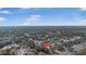 Wide aerial view showing the property location in a residential area at 7464 Acorn Cir, Spring Hill, FL 34606