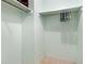 Large walk-in closet with shelving and hanging rods at 7464 Acorn Cir, Spring Hill, FL 34606