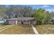 Charming one-story house with a spacious yard and driveway at 7464 Acorn Cir, Spring Hill, FL 34606