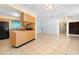 Kitchen featuring wood cabinets and a breakfast bar at 7464 Acorn Cir, Spring Hill, FL 34606
