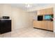 Kitchen with wood cabinets and stainless steel appliances at 7464 Acorn Cir, Spring Hill, FL 34606