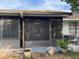 Spacious screened patio with ample room for relaxing and enjoying the outdoors at 7635 Bloomingdale Dr, New Port Richey, FL 34654