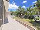 Landscaped backyard with playground and plenty of green space at 807 Virginia Ave, Tarpon Springs, FL 34689